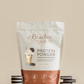 Protein powder package with cookies and cream flavor on a beige background